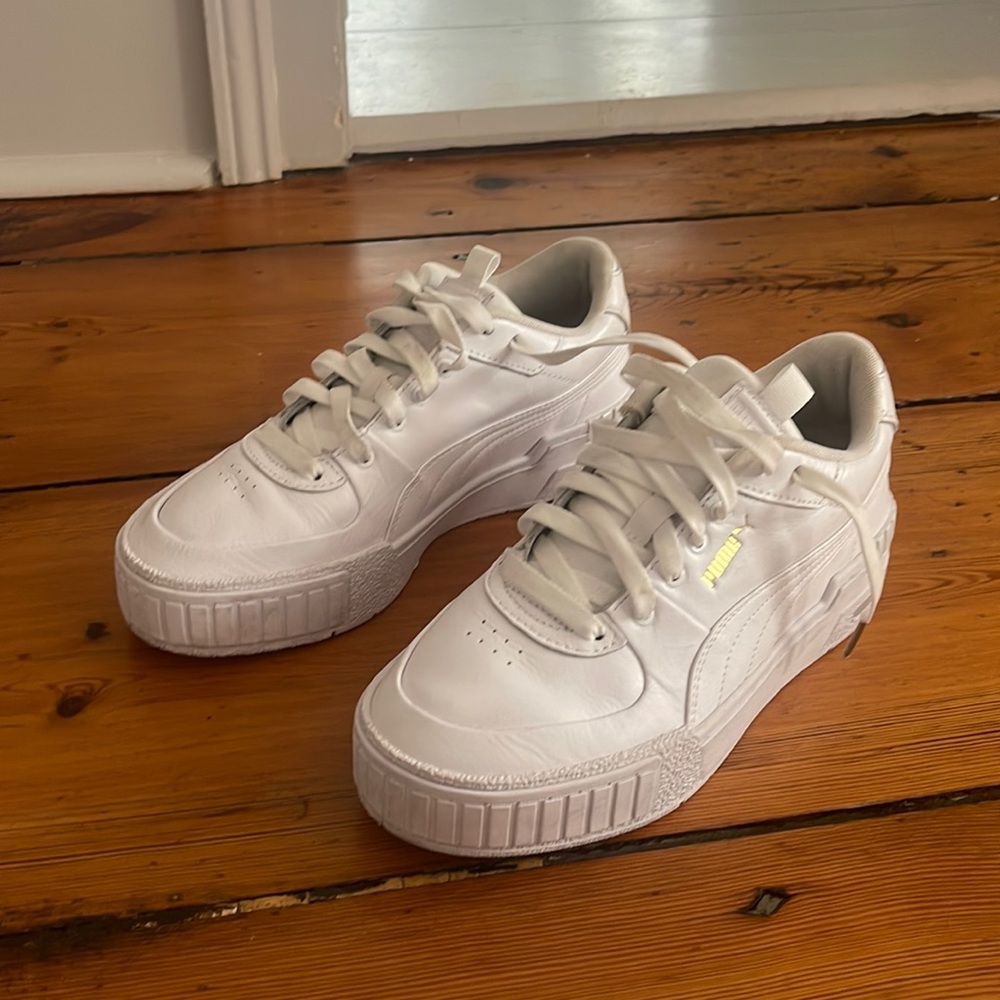white puma sneaker.